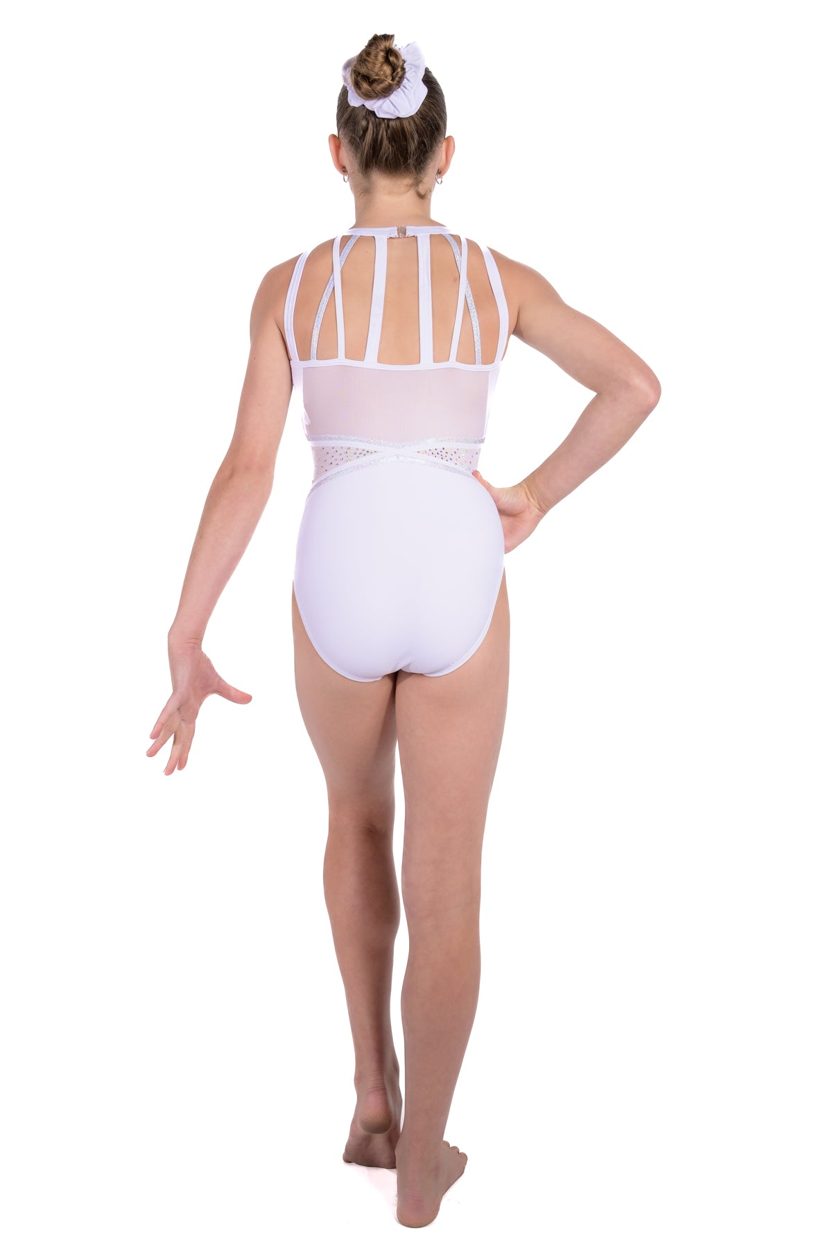 White and silver gymnastics leotard. Soft white lycra and fully lined, shimmering silver rhinestone detailing. Strappy back design with a secure clasp closure, mesh back panel.