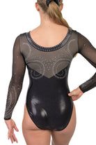 Black mystique long sleeve gymnastics leotard with mesh sleeves, flattering rhinestone design.